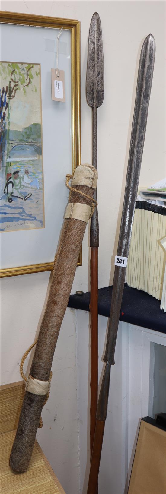 Two African Masai spears and a hide quiver and arrows